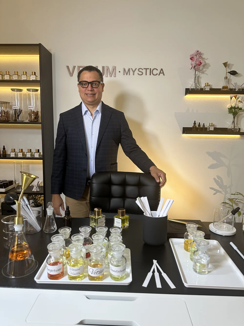 Anddy Cabrera at his perfume workbench