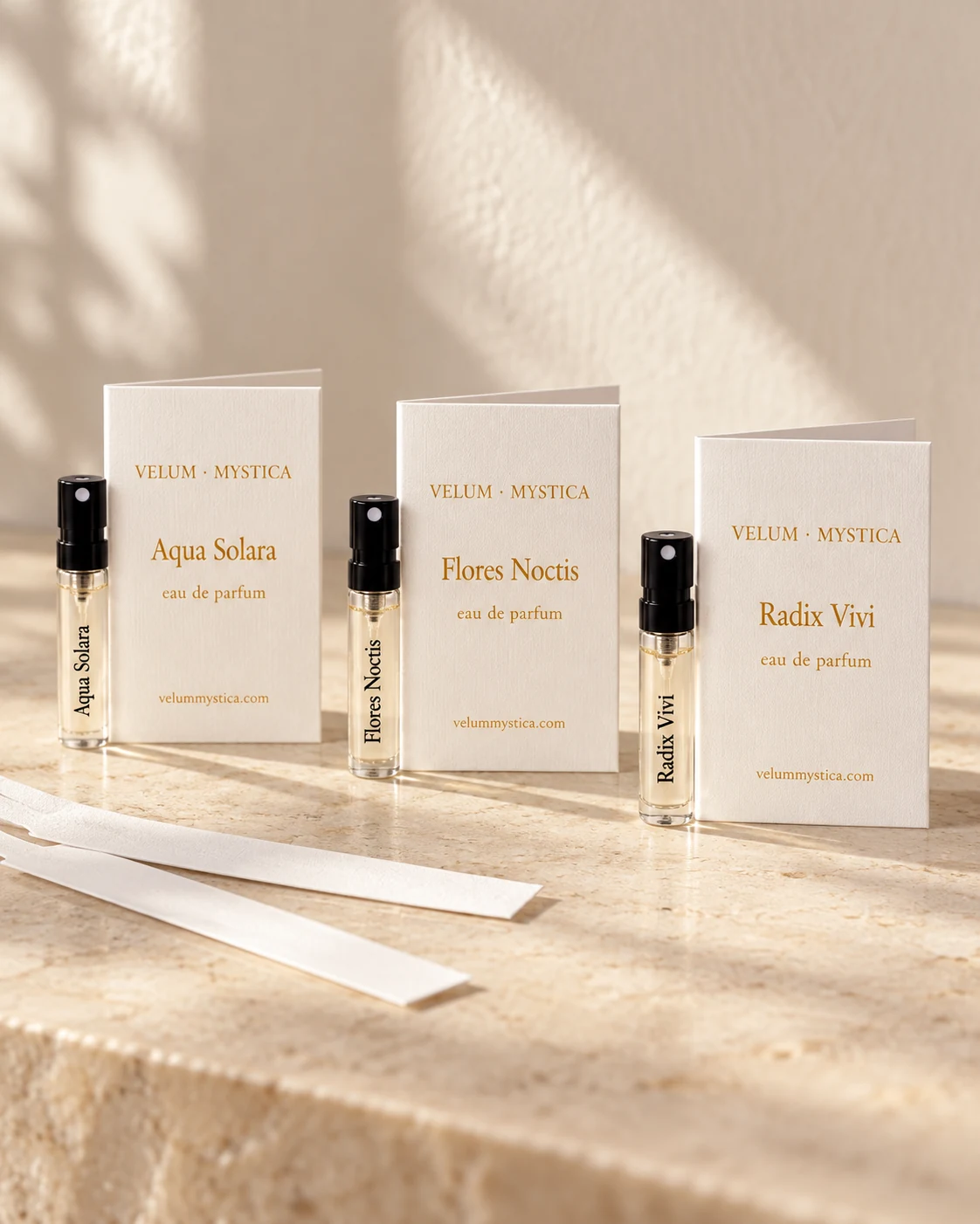 A selection of individual discovery vials with their fragrance cards
